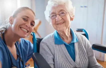 Nurse, portrait smile and medical for elderly care, retirement home or visit from doctor for appointment or checkup. Happy senior woman smiling with healthcare professional for therapy exam at clinic.