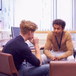 Male,College,Student,Meeting,With,Campus,Counselor,Discussing,Mental,Health